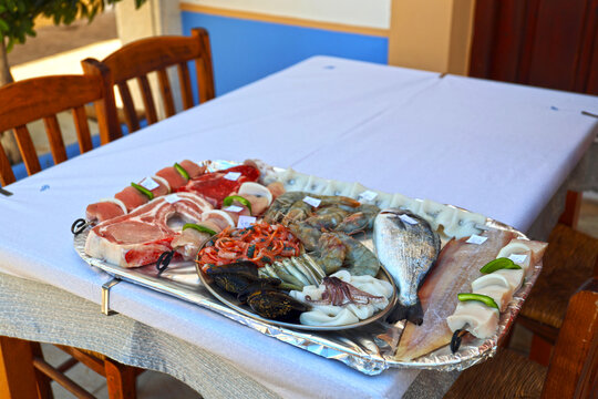 Served menu with options for selection and ordering, Symi Island, Greece.