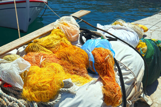 Fishing nets in the harbor of Symi Island, Greece.