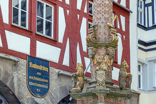 Rothenburg ob der Tauber, Bavaria, Germany &ndash; May 24, 2025: Detail of the Georgsbrunnen (Saint George's Fountain) in the central square (Marktplatz) of the nearly 800-year-old medieval town.