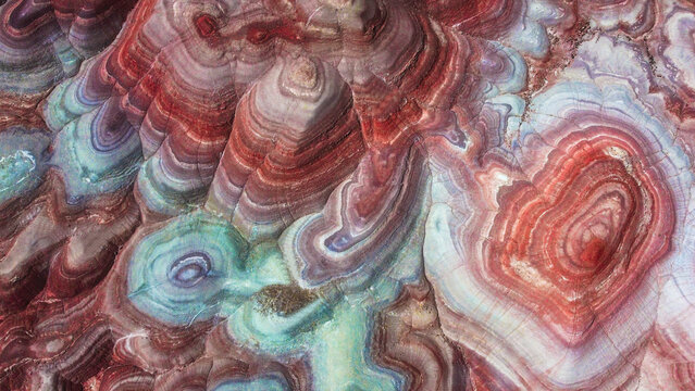 Aerial view of colorful mineral evaporation ponds in the Utah desert