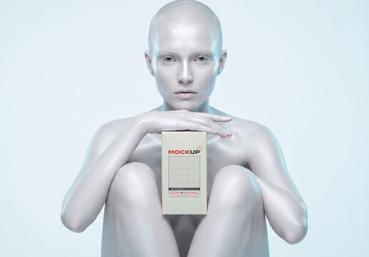 Albina Model Posing with Product Box Mockup