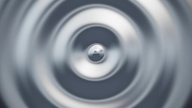 Metallic liquid ripple motion graphic background with chrome silver wave loop
