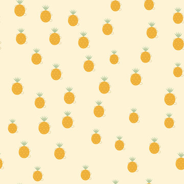 Seamless pattern of yellow pineapples on cream background