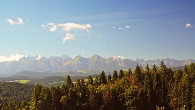 A picturesque summer panorama of the high Tatra mountain range in Podhale region, Poland.