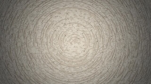 Concrete background with engraved concentric circle pattern and lighting shift