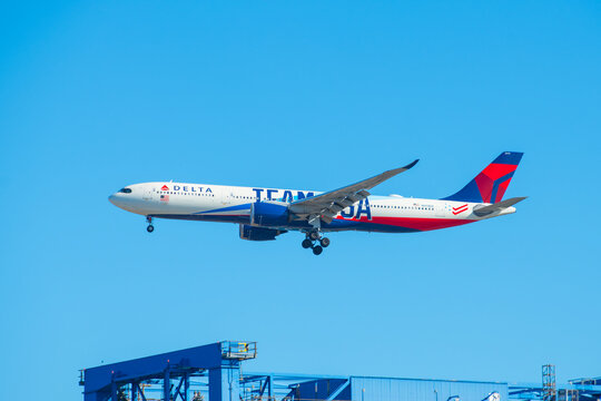 Delta Air Lines Airbus 330-900 neo N411DX with Team USA livery landing on Boston Logan International Airport (BOS), Boston, Massachusetts MA, USA. 