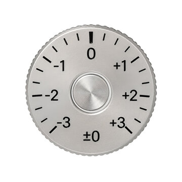 Top view of silver metal camera exposure compensation dial with scale markings from minus 3 to plus 3 isolated on white background