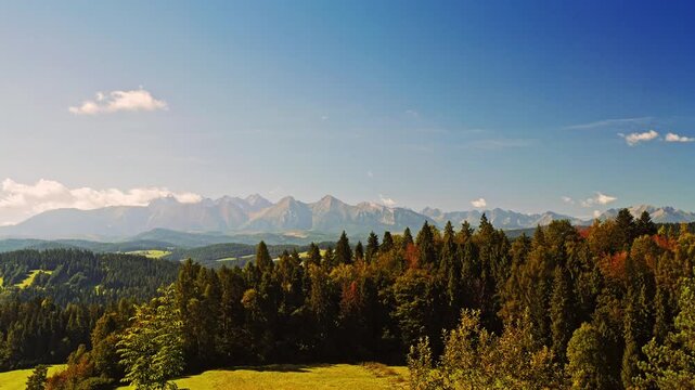 A picturesque summer panorama of the high Tatra mountain range in Podhale region, Poland.