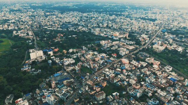 Modern Architecture in India: 4K Aerial View of the Building and City Skyline at Haze. Top down Buildings and Apartment with Multiple Building aerial.	