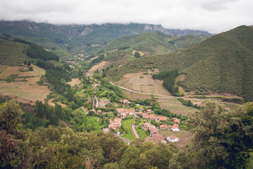 Fototapeta premium Mountain landscape and green valley from San Miguel Viewpoint in Cantabria