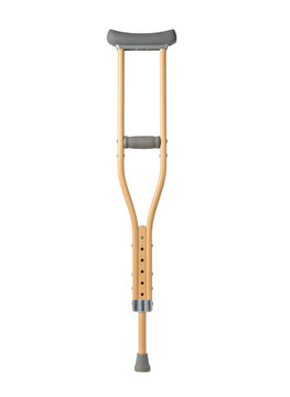 A wooden underarm crutch with grey rubber padding and adjustable height settings, isolated on a solid black background, for medical rehabilitation isolated on a transparent background