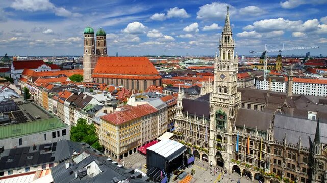 High angle time-lapse of clouds over Neues Rathaus, the New Town Hall, and Frauenkirche church in Munich, Bavaria, Germany