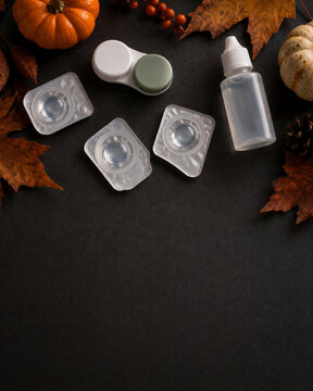 Autumn contact lens care flat lay with pumpkins