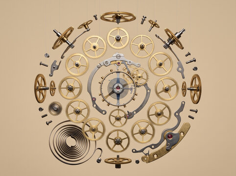 Circular arrangement of disassembled antique watch gears and mechanical clockwork parts