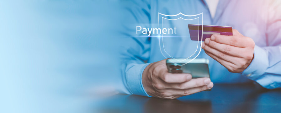 Online payment security concept, shield, identity verification, digital payment, banking security, ID card, privacy, fraud prevention and ecommerce. Smartphone and credit card with a shield.