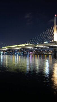 night illumination istanbul city famous traffic bridge riverside bay vertical panorama 4k timelapse turkey 