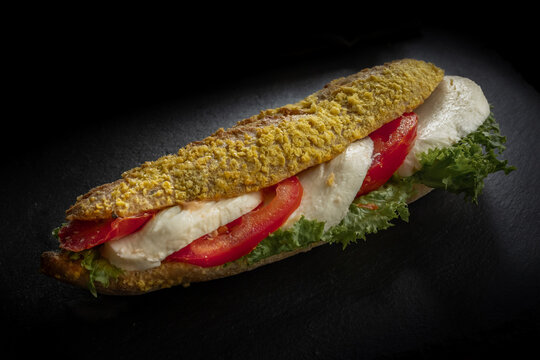 Gourmet Baguette Sandwich with Mozzarella, Tomato and Lettuce
