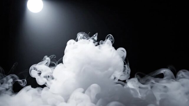 Slow motion abstract white smoke cloud on a dark background under a light source