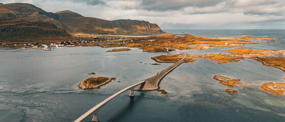 High angle aerial view of Fredvang bridges connecting rocky islands in fjord landscape in Lofoten Norway © Quality by Simon