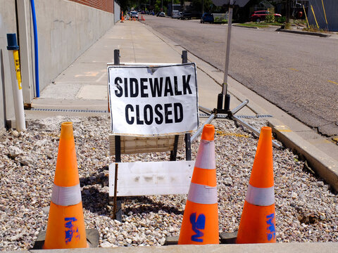 Sidewalk Closed for Construction and Repair Closed Sign to Warn of Danger Orange Cones for Maintenance and Fixing