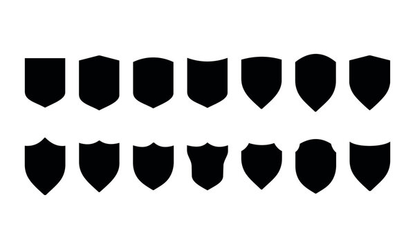 Collection of black shield shapes varied designs representing protection security defense and heraldry symbols.