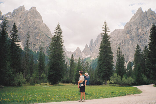Father with little daughter hiking in the mountains
