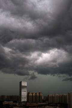 City view covered in dark clouds