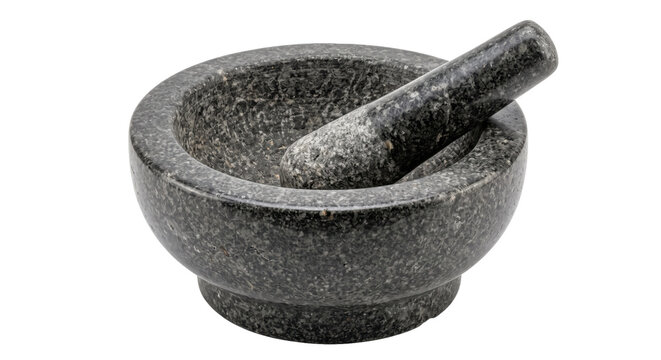 Traditional dark gray granite mortar and pestle set, used for grinding spices, is isolated on a clean white background