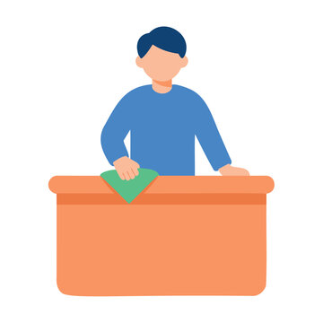A person is wiping down a counter or desk with a green cloth, wearing a blue shirt and dark hair.