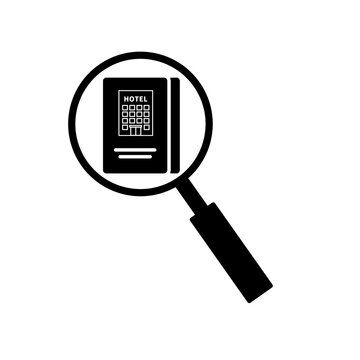 Magnifying glass with hotel building accommodation icon