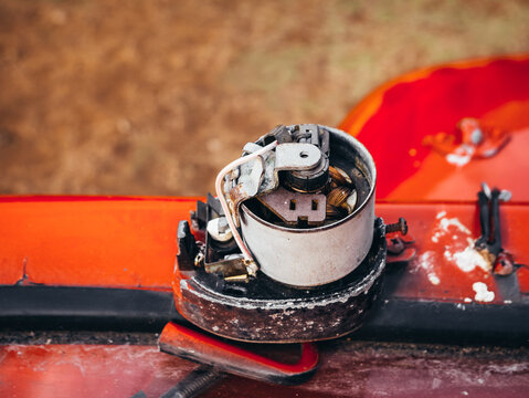 Damaged Vintage Warning Beacon Light With Exposed Electrical Mechanism

