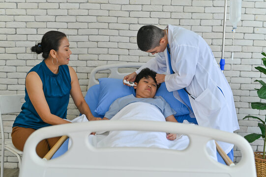 Medical professionals care for a patient in a hospital setting. Family members provide support during recovery, emphasizing compassion and healthcare.