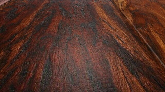 Continuous Movement Over Black Cherry Wooden Boards Showcasing Authentic Grain Patterns, Natural Surface Texture, Fine Detail and Elegant Interior Character