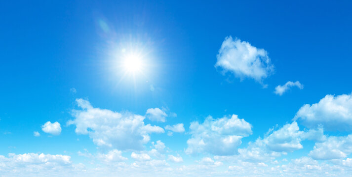 blue sky background with tiny clouds