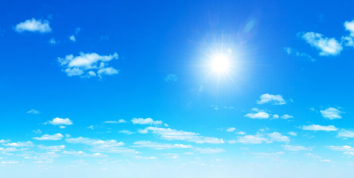 blue sky background with tiny clouds