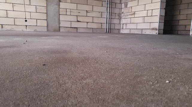 Construction of a room using foam blocks. A completed room an unfinished living space. A room built from gas silicate blocks.
