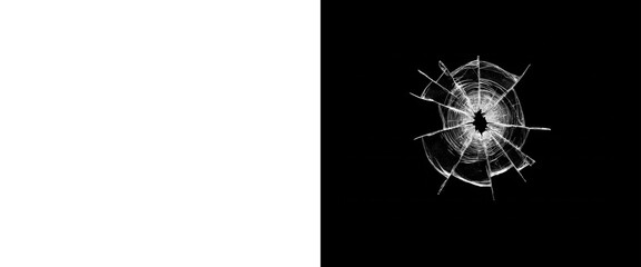Broken glass bullet hole crack texture impact effect on black background © Motion Mania