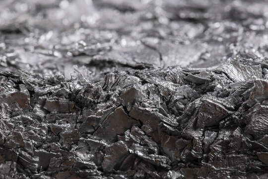 Compressed aluminum scrap, abstract texture, industrial background, recycled non ferrous metal waste associated, raw material for metallurgical industry