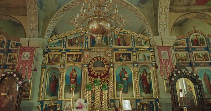 Ornate Golden Iconostasis With Icons And Reliquaries Displayed
