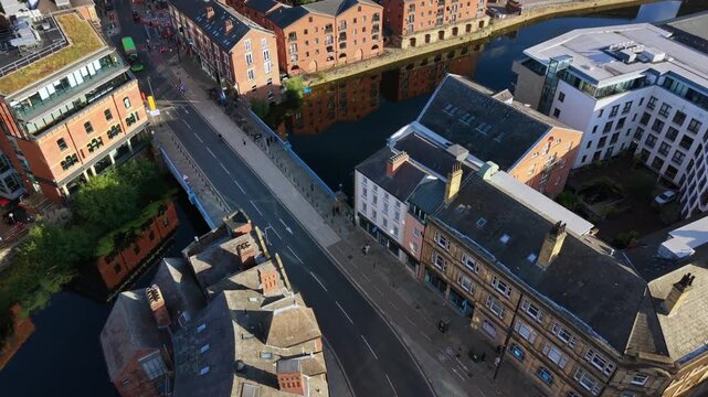 Aerial Video Over Leeds Bridge and River Aire Waterfront at Sunrise