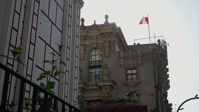 Colonial Building and Peruvian Flag Waving in Downtown Lima