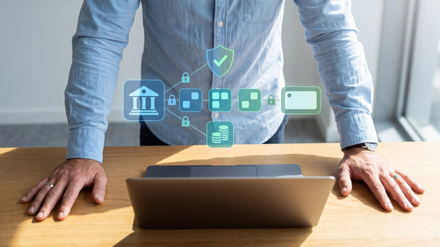 Digital banking security and online finance protection concept. Man with laptop and bank network connected by padlocks, shield and coins for fintech payment encryption and data privacy