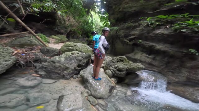Stunning Dao Falls and Tumalog Falls cascade in lush tropical jungle canyon Cebu Philippines