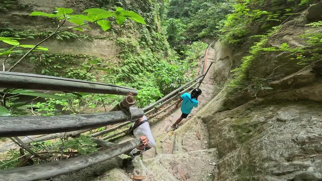 Stunning Dao Falls and Tumalog Falls cascade in lush tropical jungle canyon Cebu Philippines