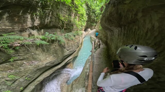 Stunning Dao Falls and Tumalog Falls cascade in lush tropical jungle canyon Cebu Philippines