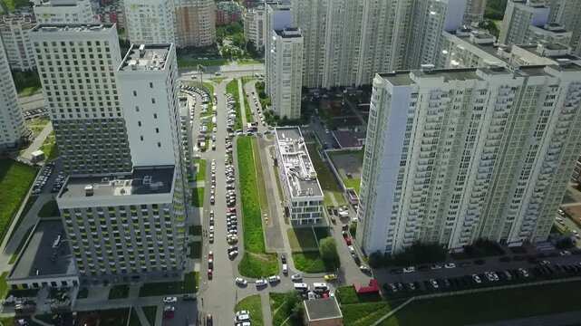 Drone pulling back and up over Khimki hospital block