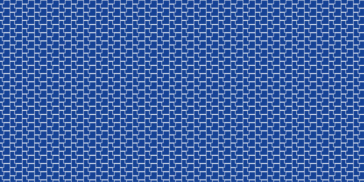 Seamless geometric pattern with white interlocking l-shaped tiles on a blue background