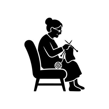 Elderly woman sitting in armchair knitting with yarn and needles for grandmother hobby cozy home leisure craft activities and retirement lifestyle concept design.