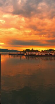  Spectacular sunrise at the port of Arona in Italy