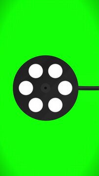 Stylized black film reel graphic for camera movie and animation video production over a vibrant green screen background